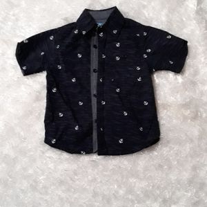 Blue button down shirt anchor pattern